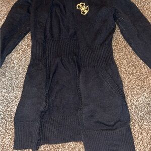 Elegant Black Knit Sweater with Gold Emblem